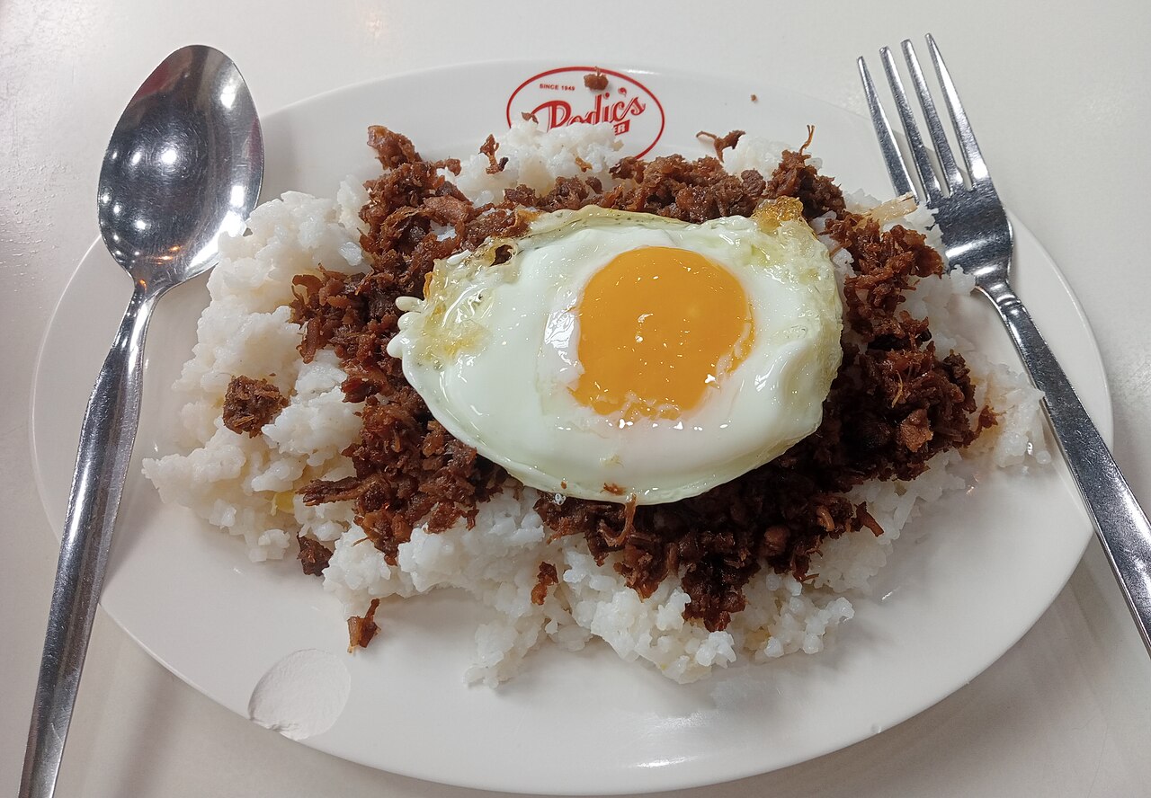 Tapsilog with beef tapa, rice, and a fried egg